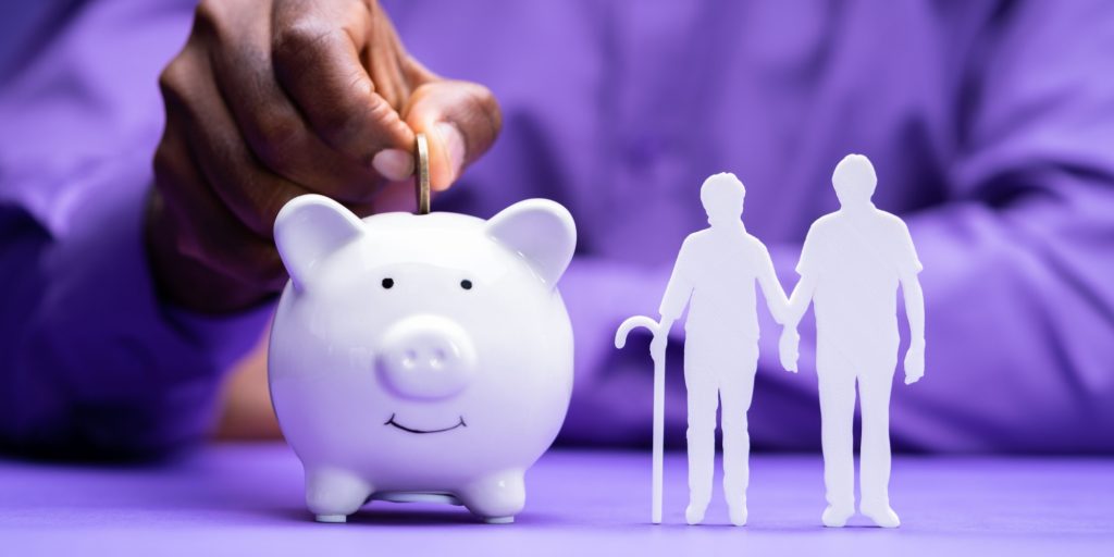 African American Saving In Piggy Bank For Retirement