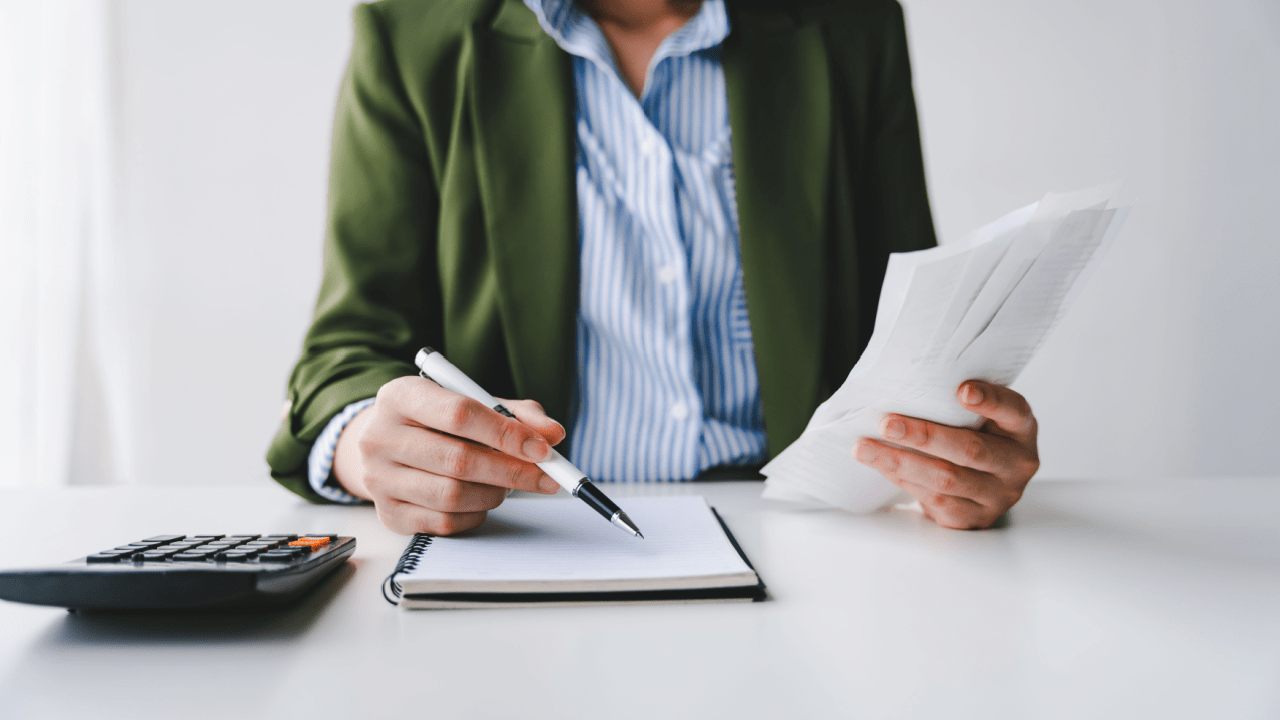 Professional bankruptcy attorney reviewing Chapter 7 filing documents to help clients understand how many times can you file chapter 7 bankruptcy
