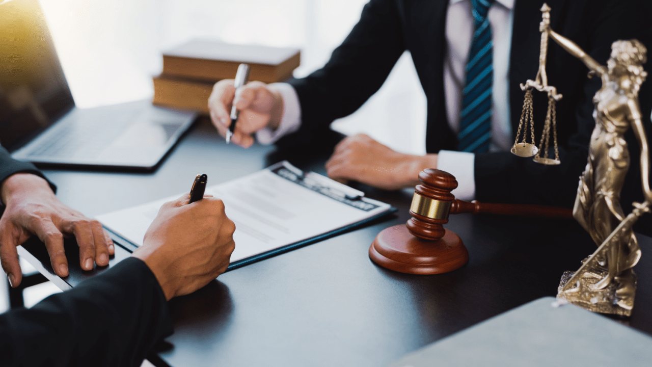 Attorney consultation showing how much is it to file for bankruptcy costs and legal paperwork