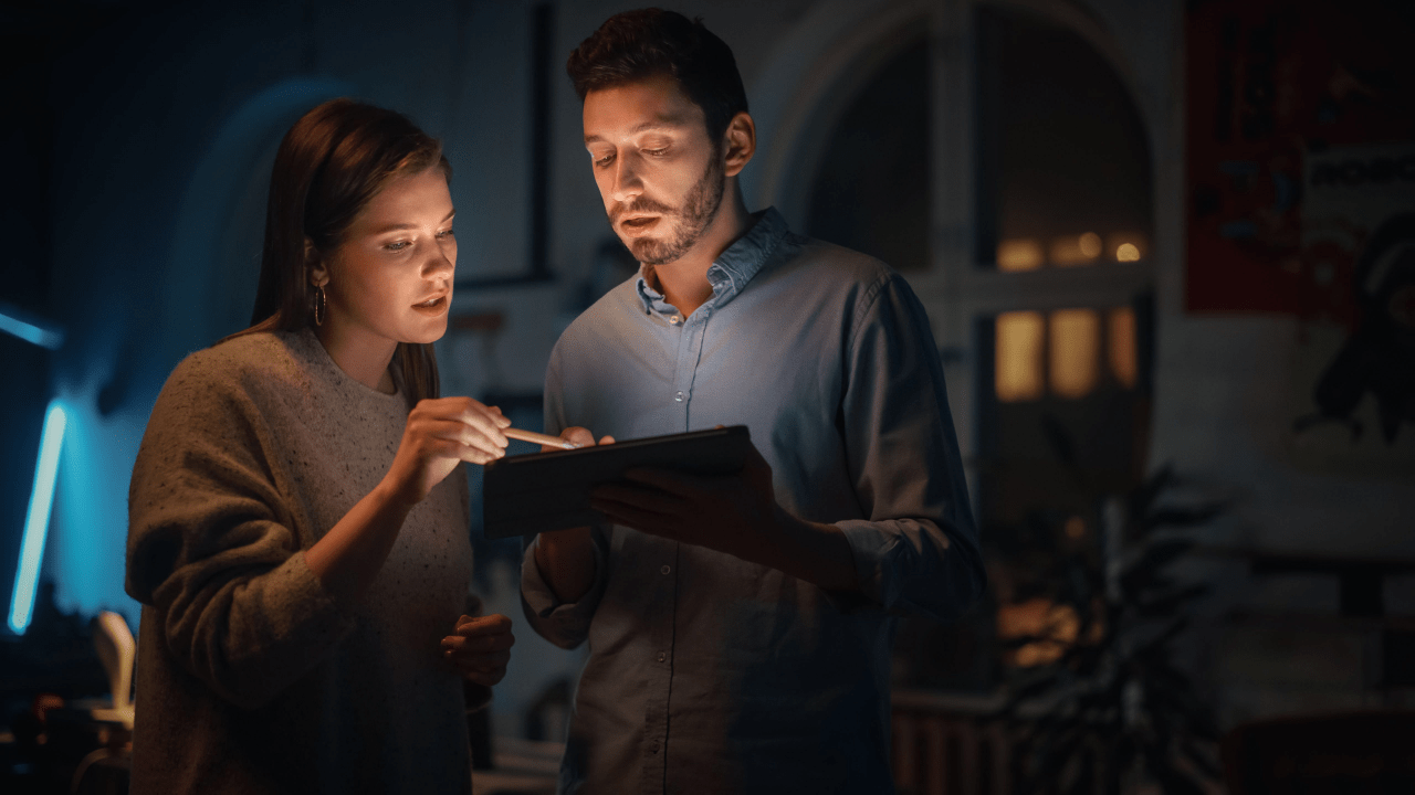 Couple reviewing documents to understand what happens when you file chapter 7 bankruptcy