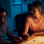 Couple reviewing documents about what happens to your house if you file bankruptcy