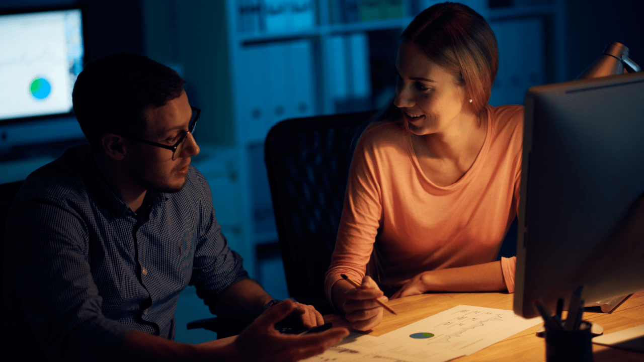 Couple reviewing documents about what happens to your house if you file bankruptcy