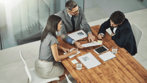 Professional meeting discussing when can you file bankruptcy with financial document review