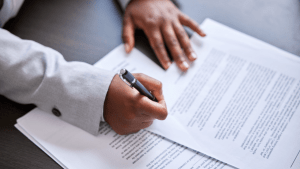 Professional reviewing legal documents to determine when to file bankruptcy chapter 13