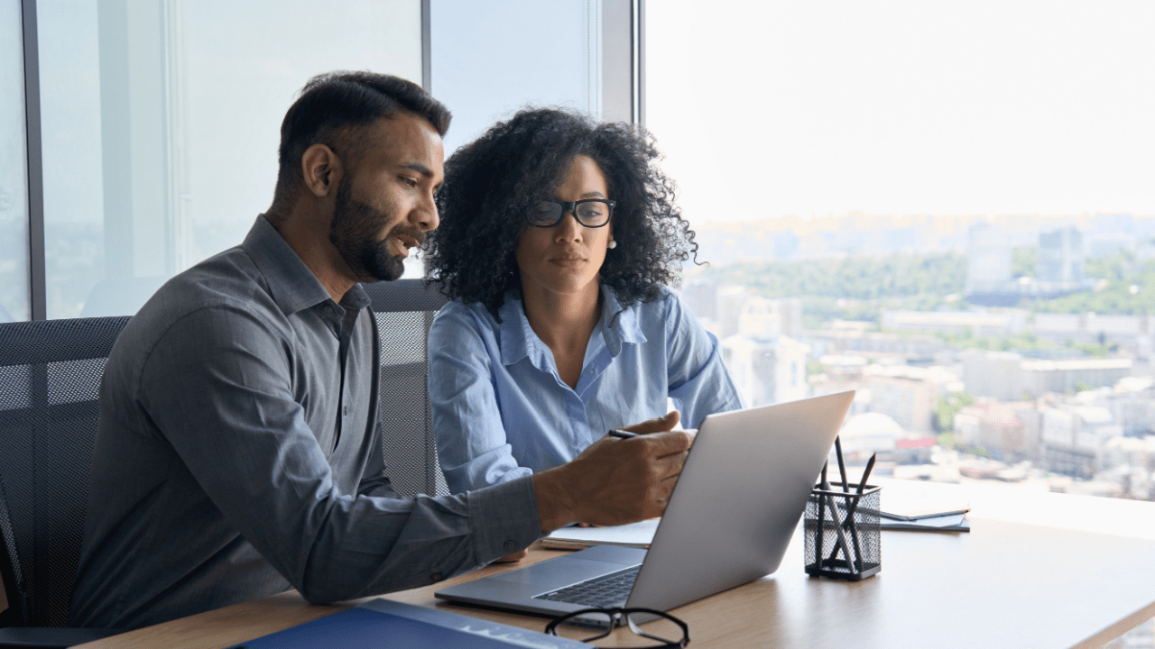 Couple consulting bankruptcy attorney website to understand why would someone file for bankruptcy