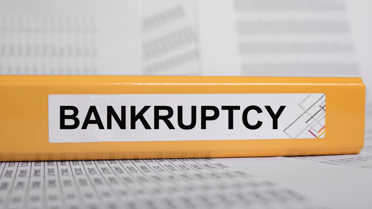 Bankruptcy folder on desk showing what are the different types of bankruptcy filing documents