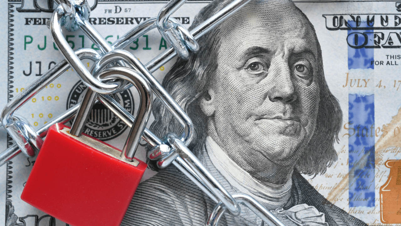 Do you lose all your stuff in bankruptcy - $100 bill secured with chains and red padlock representing asset protection and property exemptions