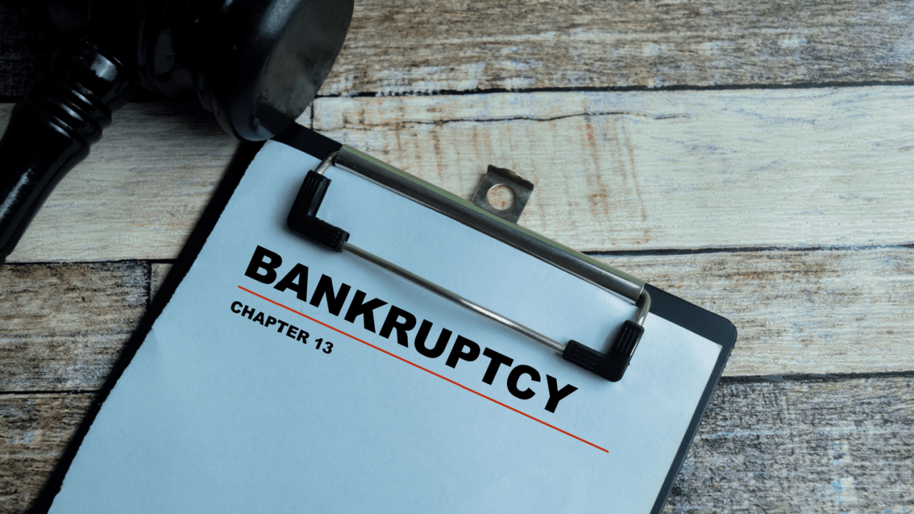 What assets do you lose in Chapter 13 bankruptcy clipboard with gavel on wooden desk