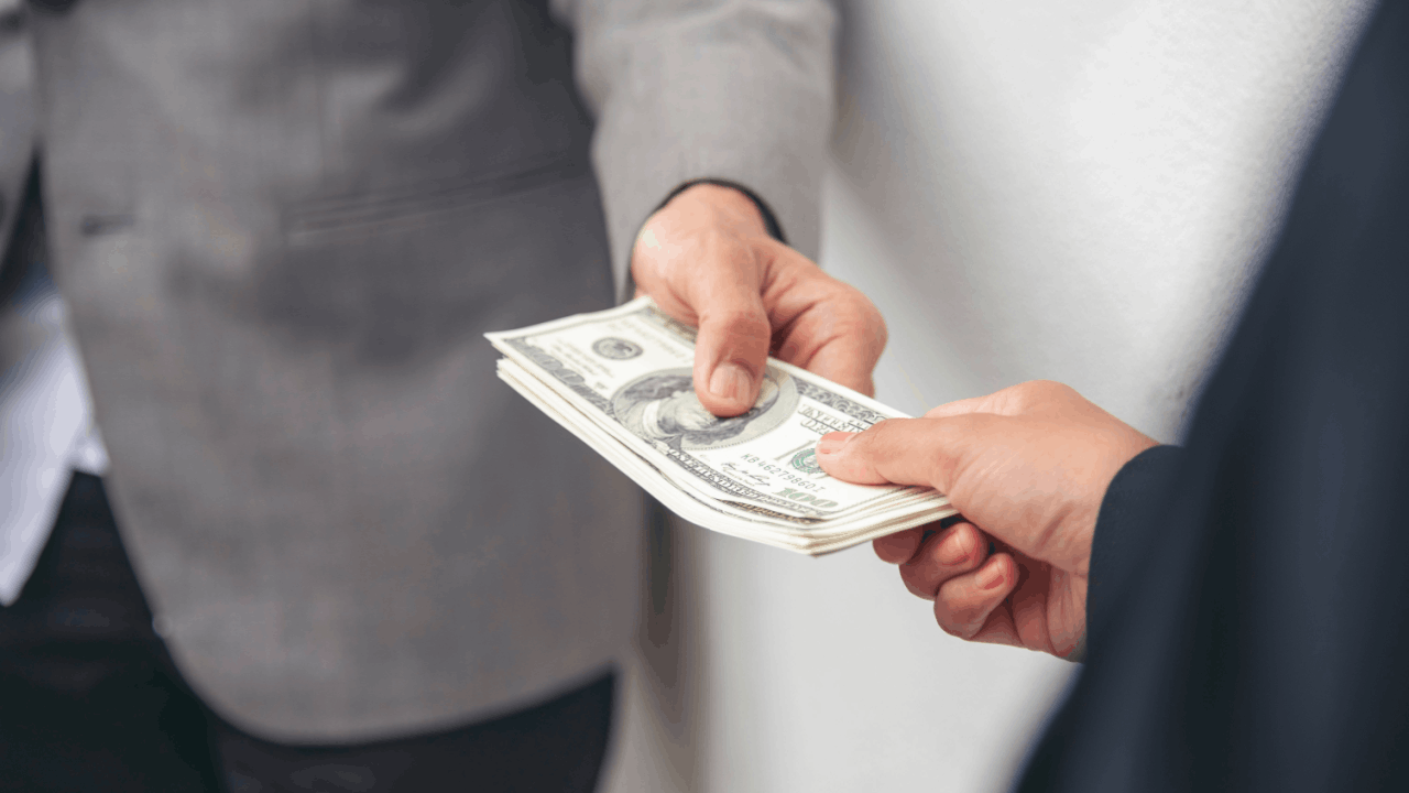 How long does a Chapter 13 take to pay off, with hands exchanging money representing repayment plan duration