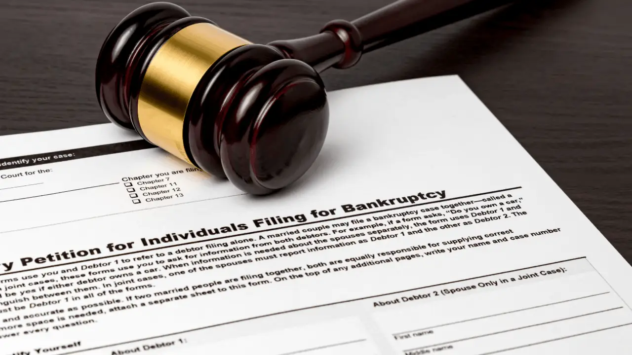 Attorney fees for Chapter 13 bankruptcy petition form with judge's gavel representing legal costs and debt relief filing process