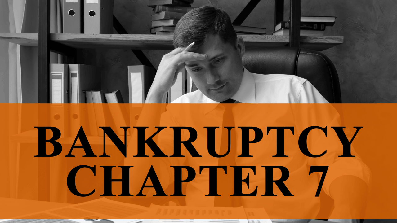 what can you not do after Chapter 7 bankruptcy — stressed man reviewing debt documents at desk