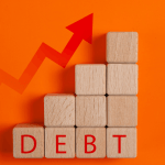 Does Chapter 11 forgive debt — wooden blocks spelling DEBT with rising arrow graph on orange background