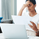 Woman overwhelmed comparing what's worse Chapter 7 or Chapter 11 bankruptcy