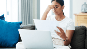 Woman overwhelmed comparing what's worse Chapter 7 or Chapter 11 bankruptcy