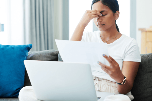 Woman overwhelmed comparing what's worse Chapter 7 or Chapter 11 bankruptcy